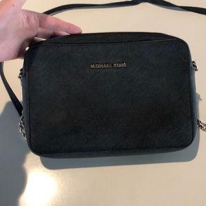 Michael Kors black side purse. Some flaws.